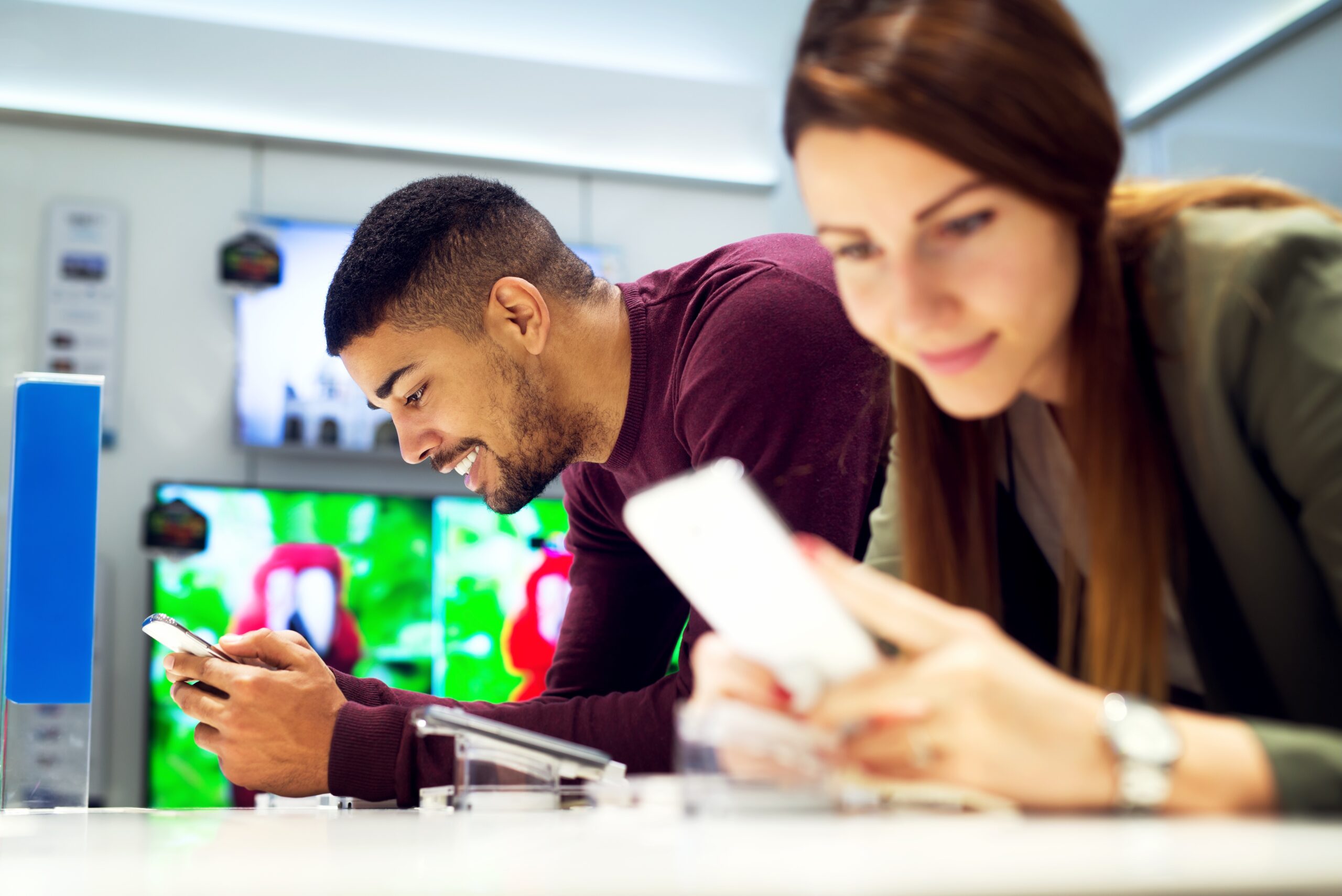customers experiencing smartphones in a telco store